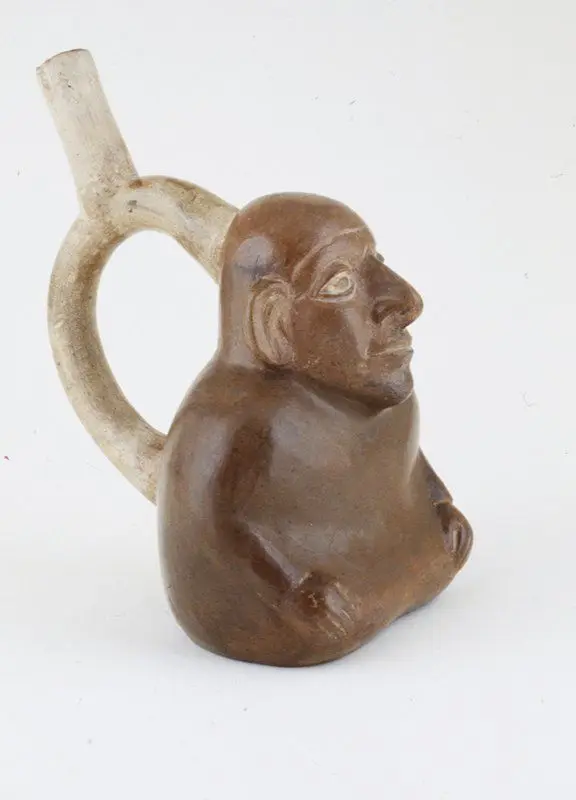 Vessel in the form of a seated man by Moche artist