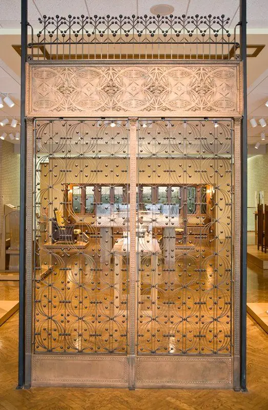 Pair of elevator grilles, frieze, and overgrille by Designer: Louis Henri Sullivan