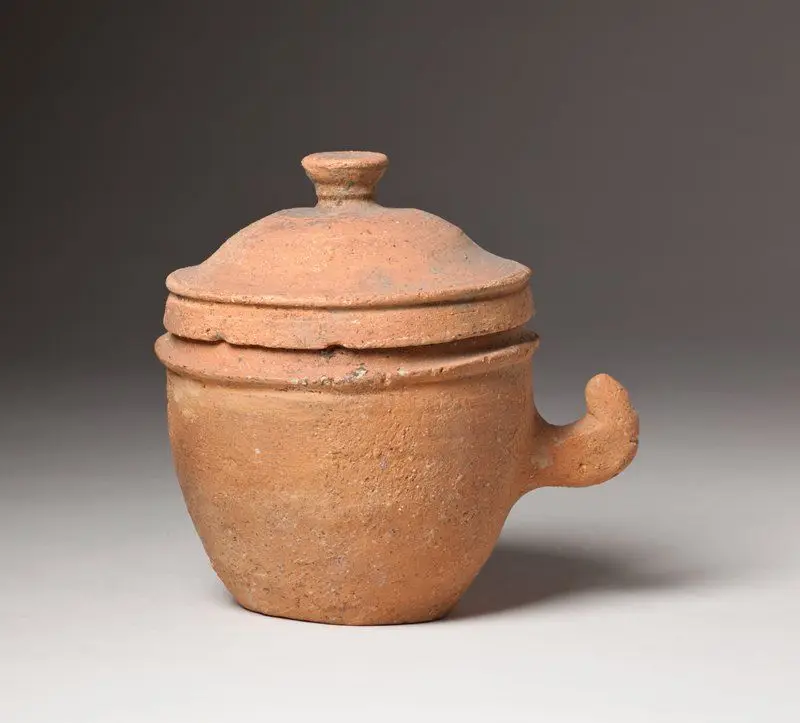 Small lidded jar with handle by Korea