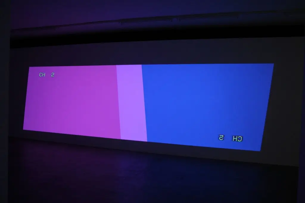 Two Key-stoned Projectors (one upside down version 2) by Cory Arcangel