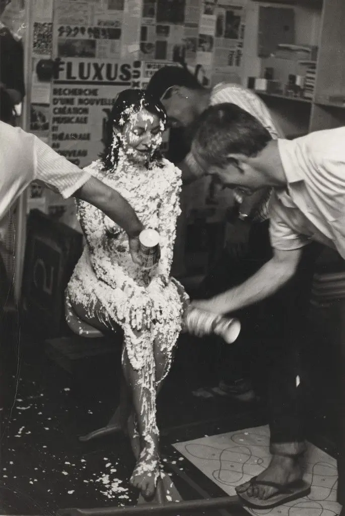 Lick Piece (1962), performed by Lette Eisenhauer during Fully Guaranteed 12 Fluxus Concerts, Canal Street, New York, May 9, 1964 by Benjamin Patterson, Peter Moore