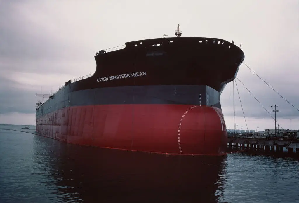 The rechristened Exxon Valdez awaiting sea trials after repairs. National Steel and Shipbuilding Company. San Diego harbor from the series Fish Story by Allan Sekula