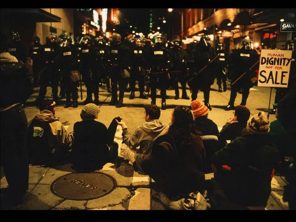 Waiting for Tear Gas (white globe to black) by Allan Sekula
