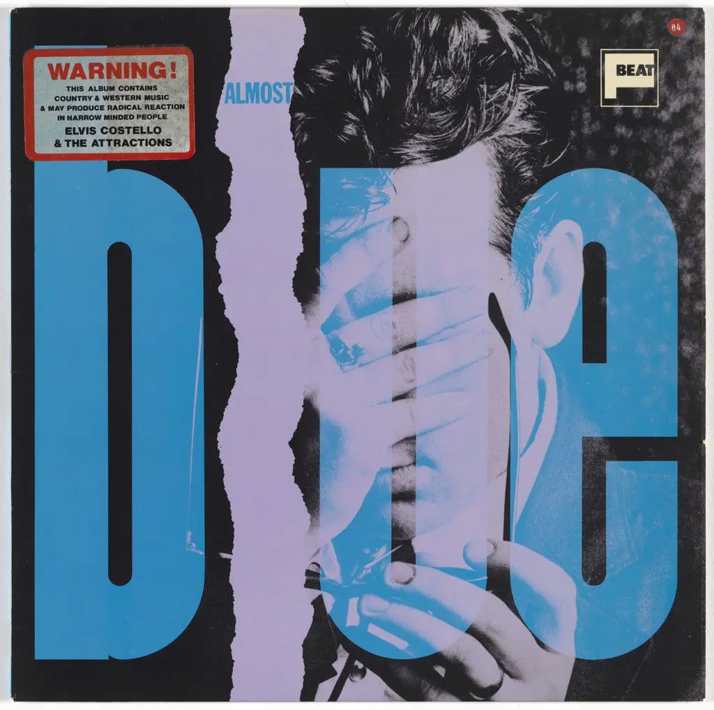 Album cover for Elvis Costello and the Attactions, Almost Blue by Barney Bubbles (Colin Fulcher), F-Beat Records