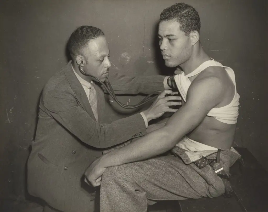 Joe Louis, Medical Check-up Prior to Second Match with Buddy Baer, Griffith Stadium, Washington, D.C. by Robert H. McNeill