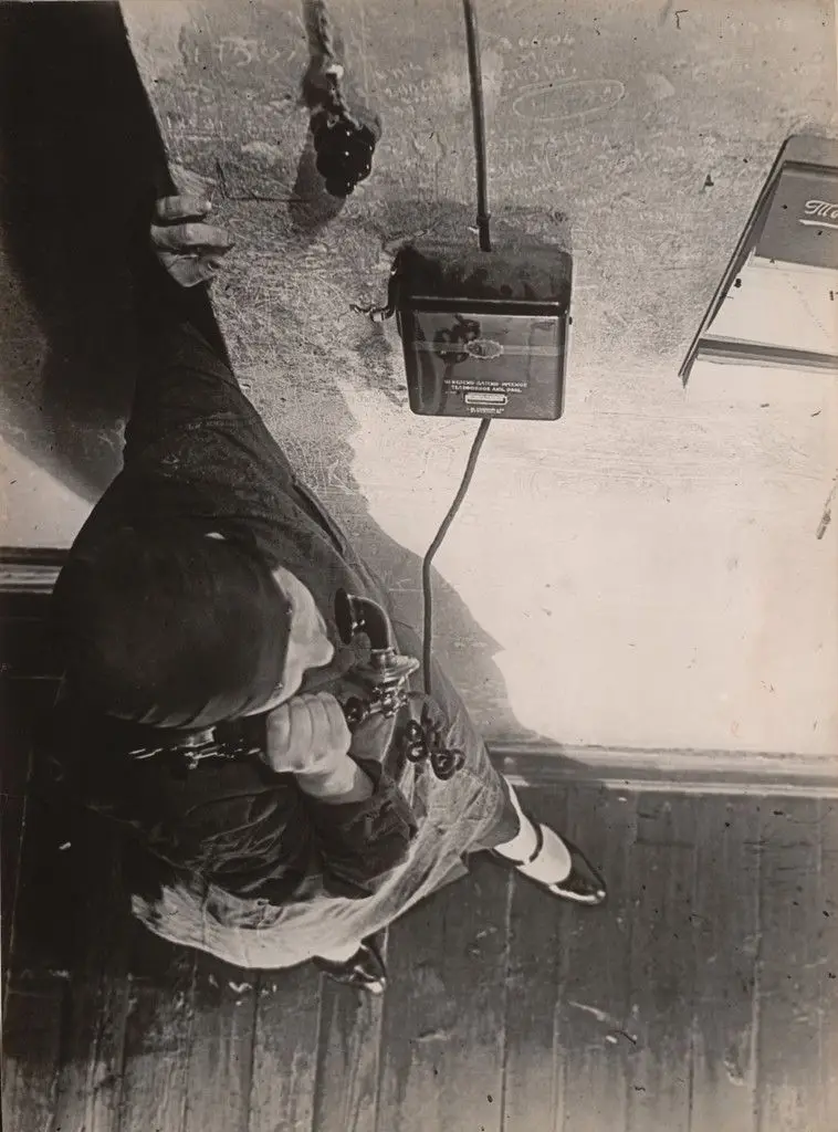 At the Telephone by Aleksandr Rodchenko