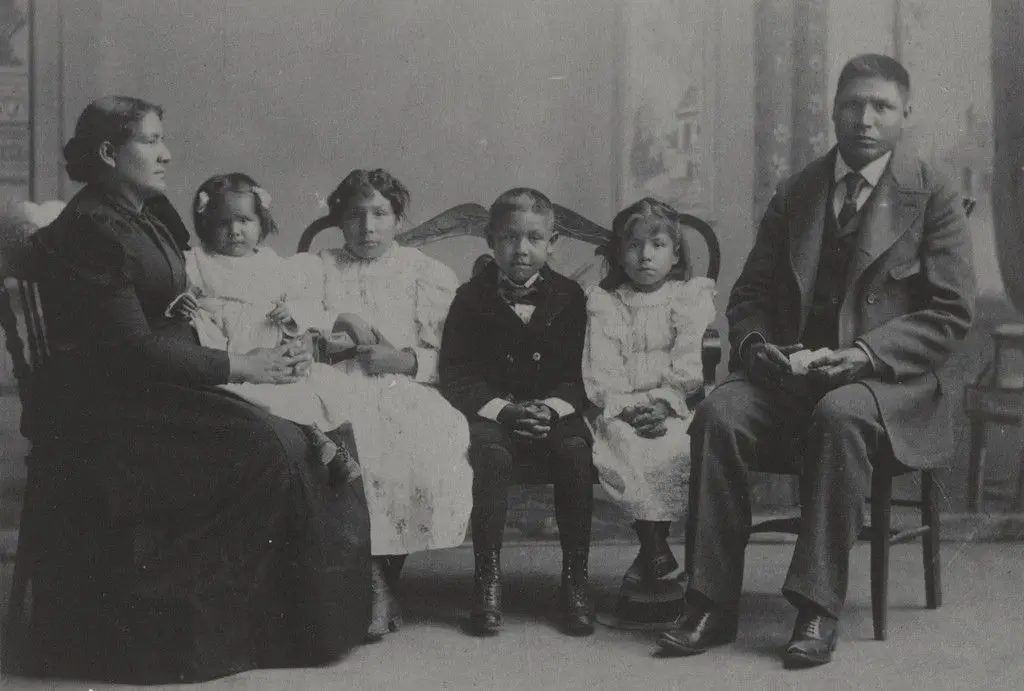 Benjamin and Ida Brave - Hampton students - and their family. Sioux by Frances Benjamin Johnston