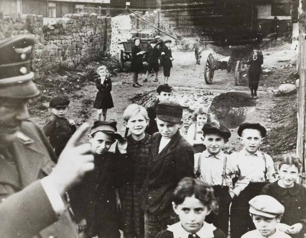 "A German Officer Lectures Children in the Ghetto in Lublin" by Associated Press