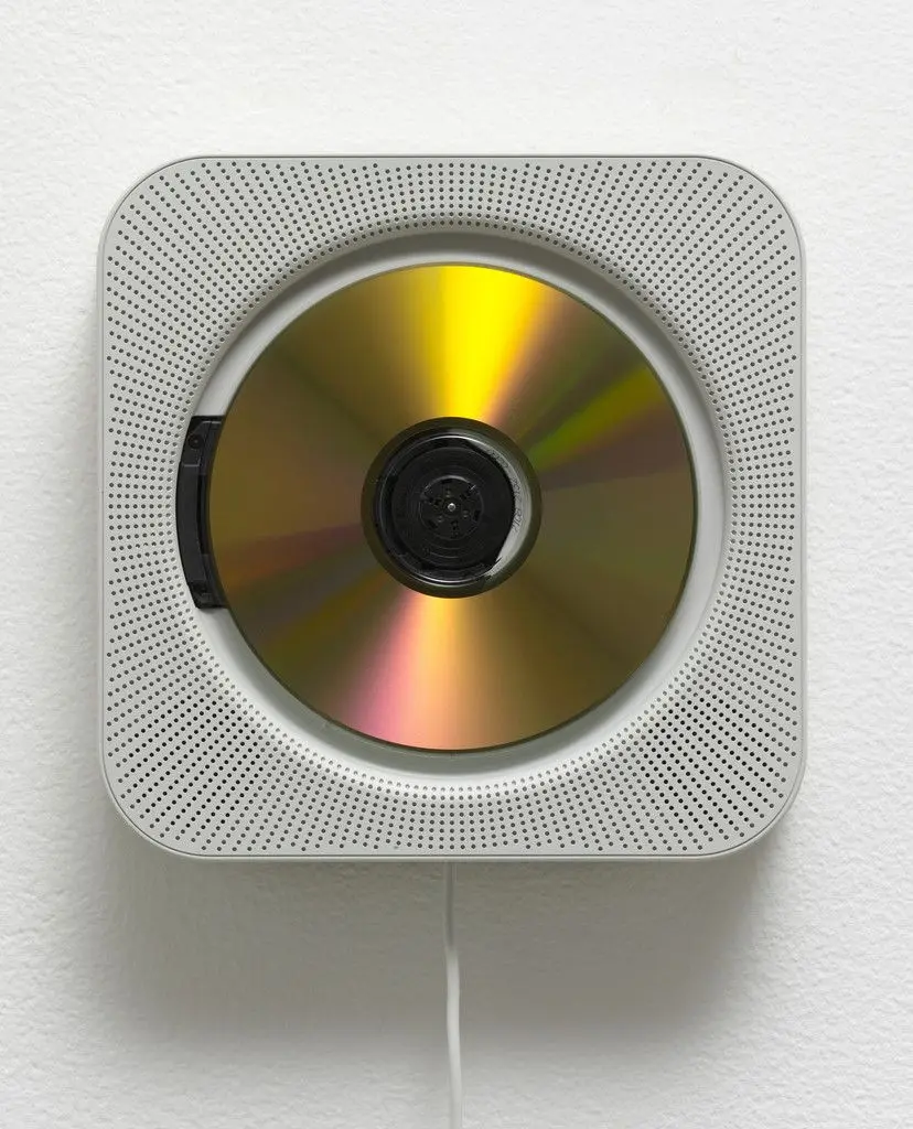Wall-mounted Compact Disc Player by Naoto Fukasawa