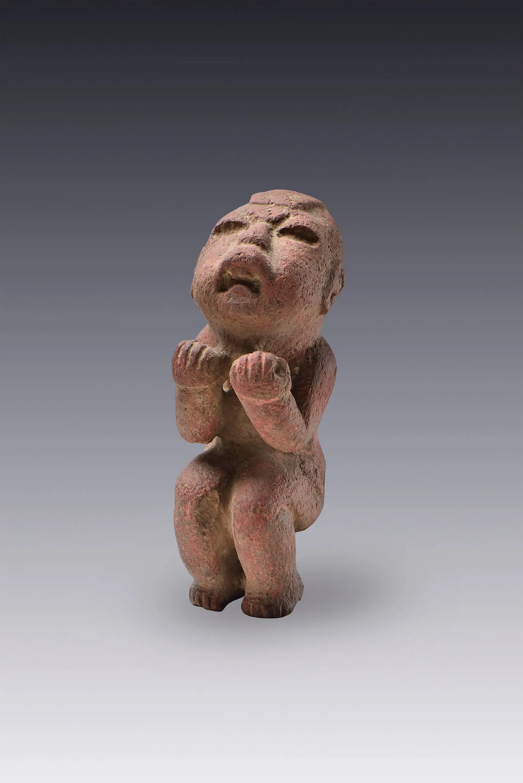 Personaje en actitud de esfuerzo by Olmeca