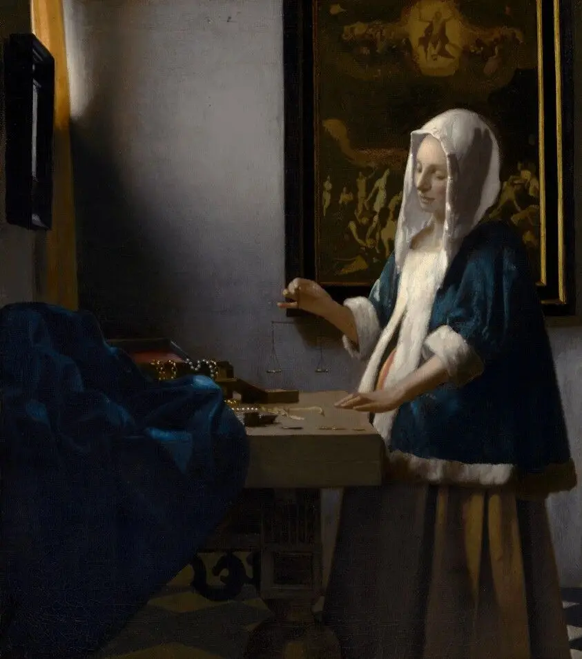 Woman Holding a Balance by Vermeer, Johannes
