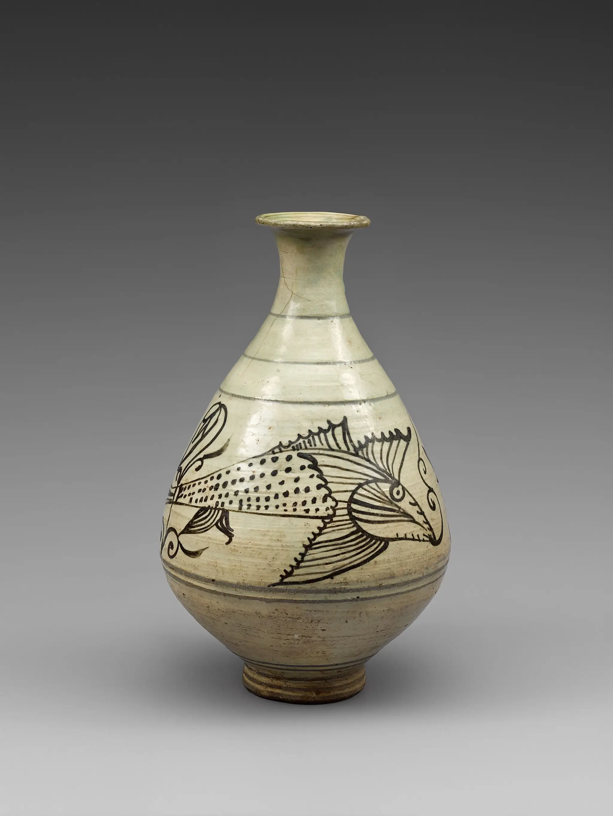 Buncheong Bottle with Lotus and Fish Design in Underglaze Iron Brown by Unknown artist
