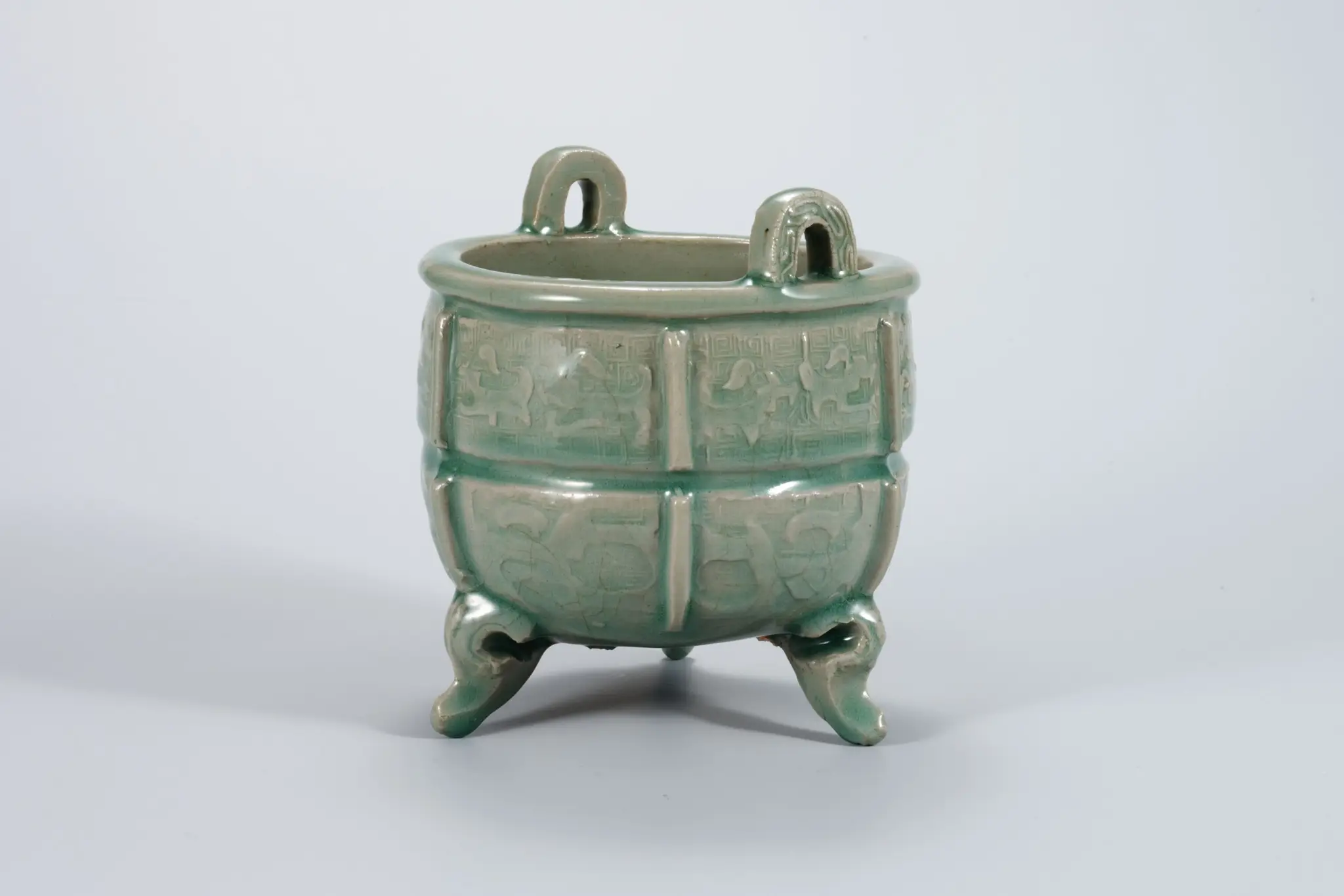 Celadon Incense Burner with Ogre Mask Design in Relief by Unknown artist