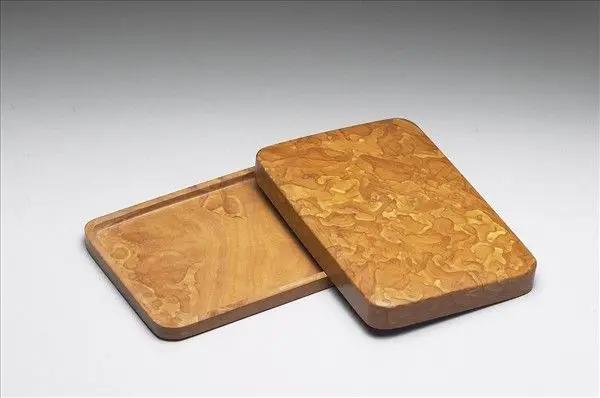 Songhua inkstone box featuring ochre pattern of stone texture by Unknown artist