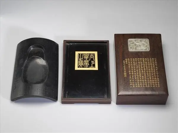 Fine clay inkstone in the shape of a Han dynasty roof tile from the Bronze Bird Terrace (Tong-que-tai) by Unknown artist