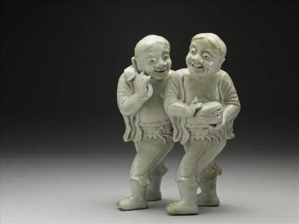 Porcelain figures of the “Duo immortals of union and harmony” in white glaze by Unknown artist