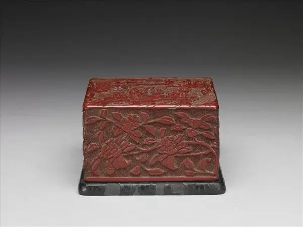 Carved-red lacquer rectangular box decorated with figures in landscape by Unknown artist