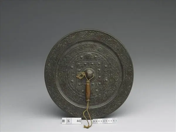 Bronze mirror with sexagenary cycle and knob decoration by Unknown artist