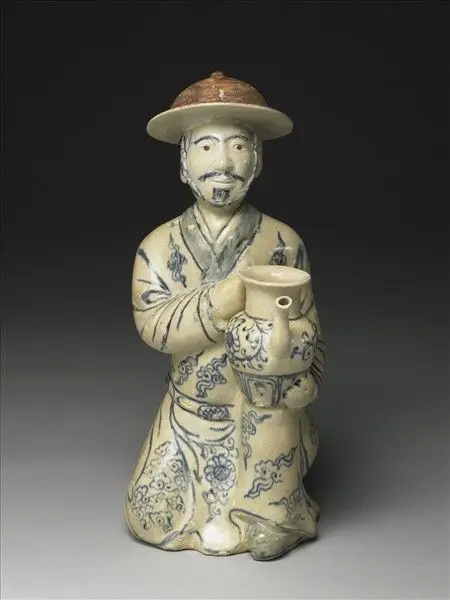 Vietnamese kneeling figure in underglazed blue and white by Unknown artist
