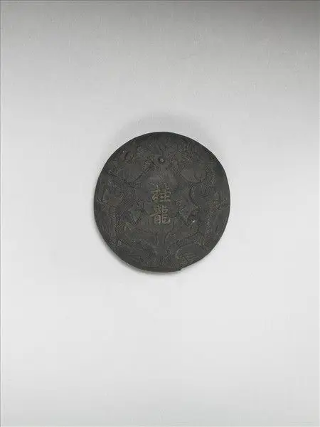 Ink stick with decor of dragons and phoenixes and insciption of "Gui Long", Ming dynasty (1368-1644) by Unknown artist