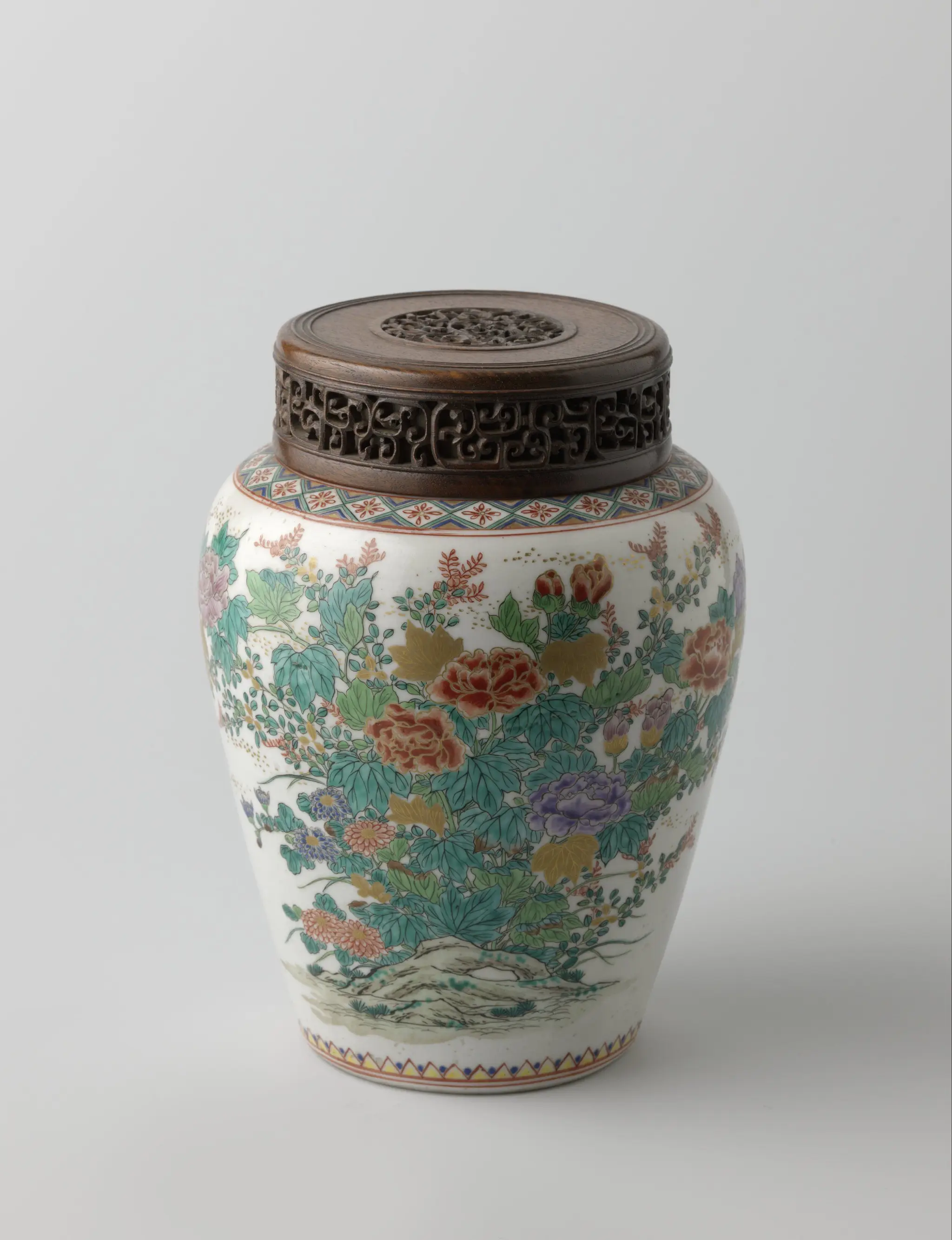 Jar with wooden cover and two large flower groups by anonymous