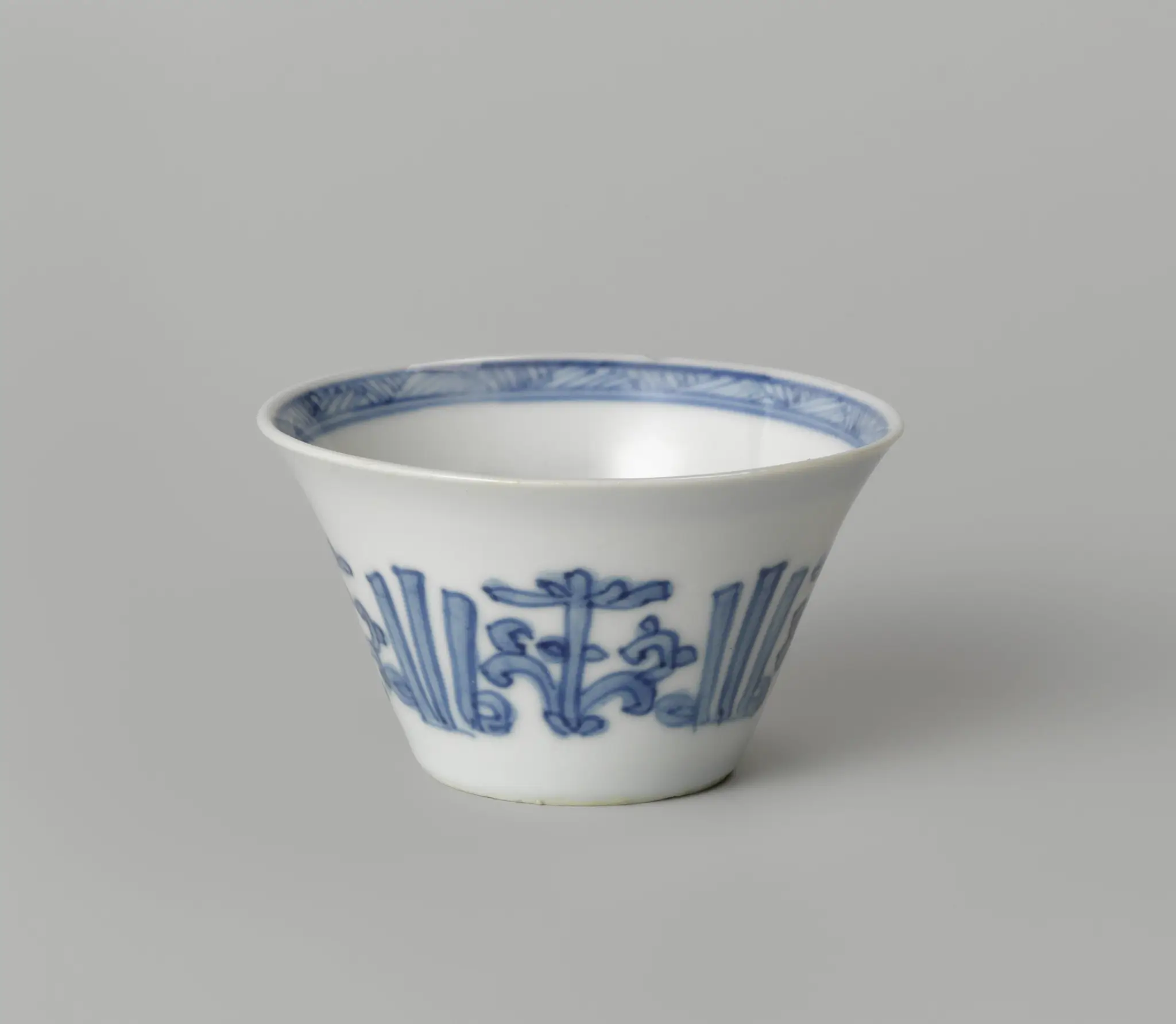 Cup with stylised flowers by anonymous