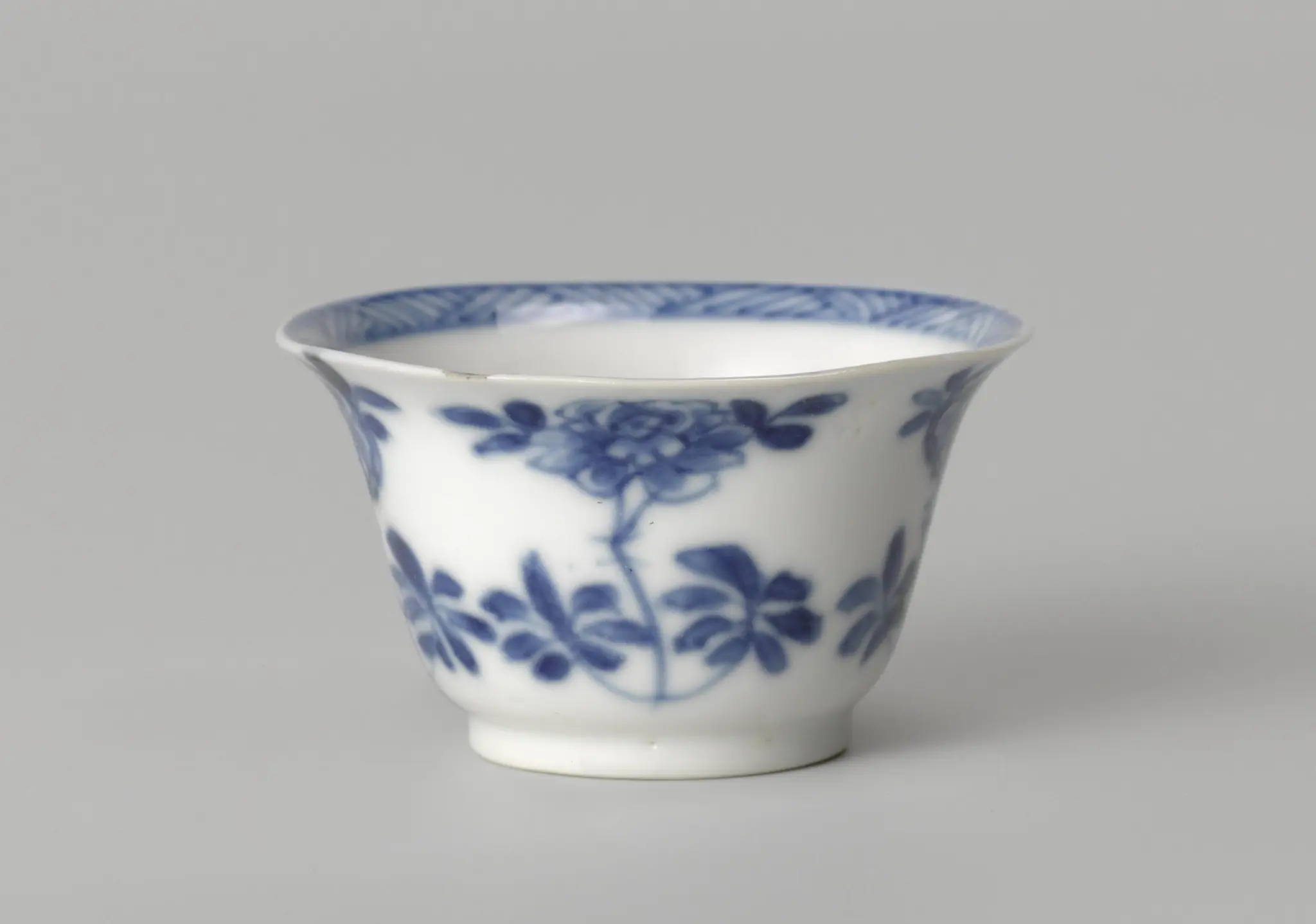 Bell-shaped cup with flower sprays by anonymous