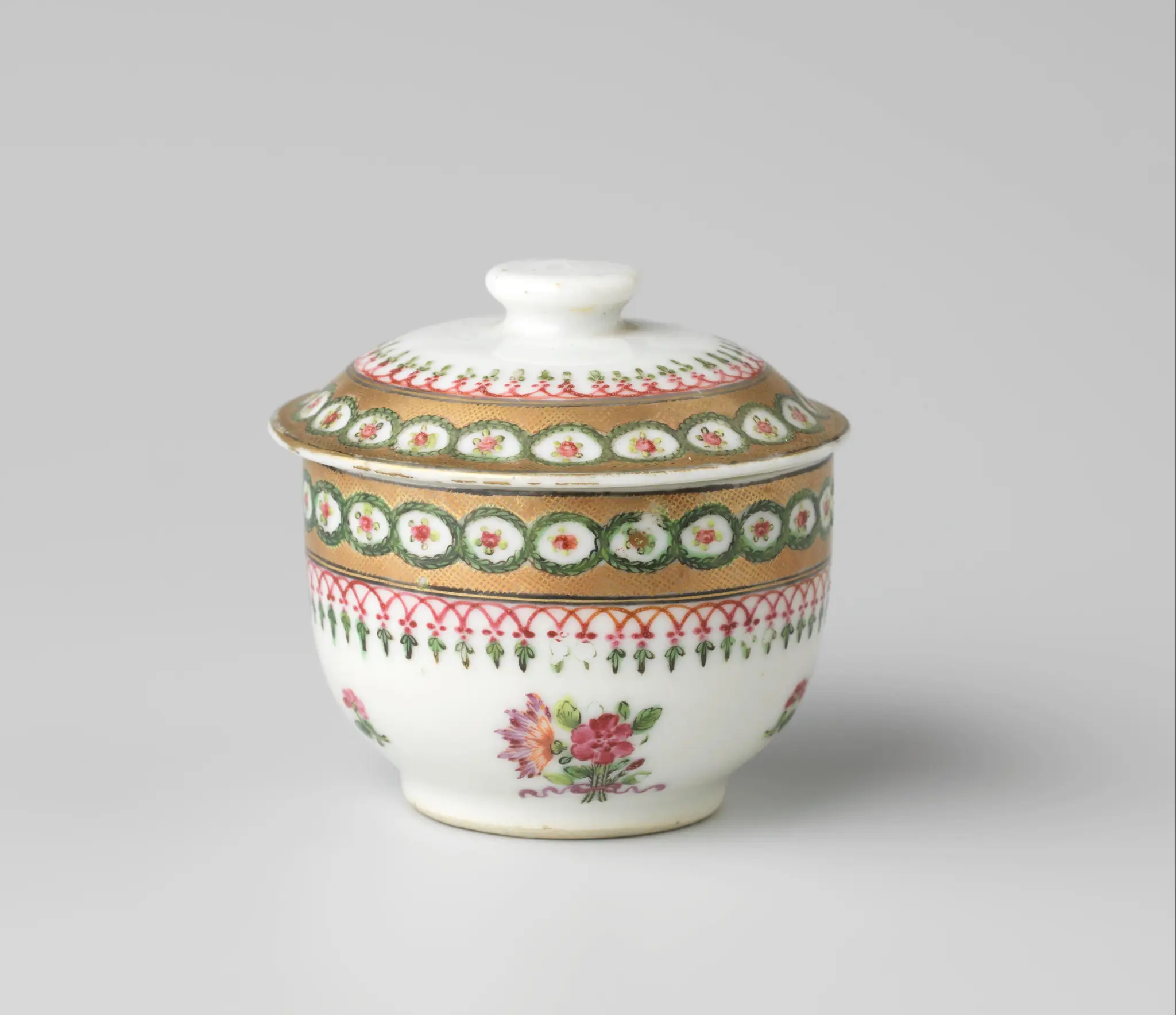 Covered jar with bouquets, scattered flowers and ornamental borders by anonymous