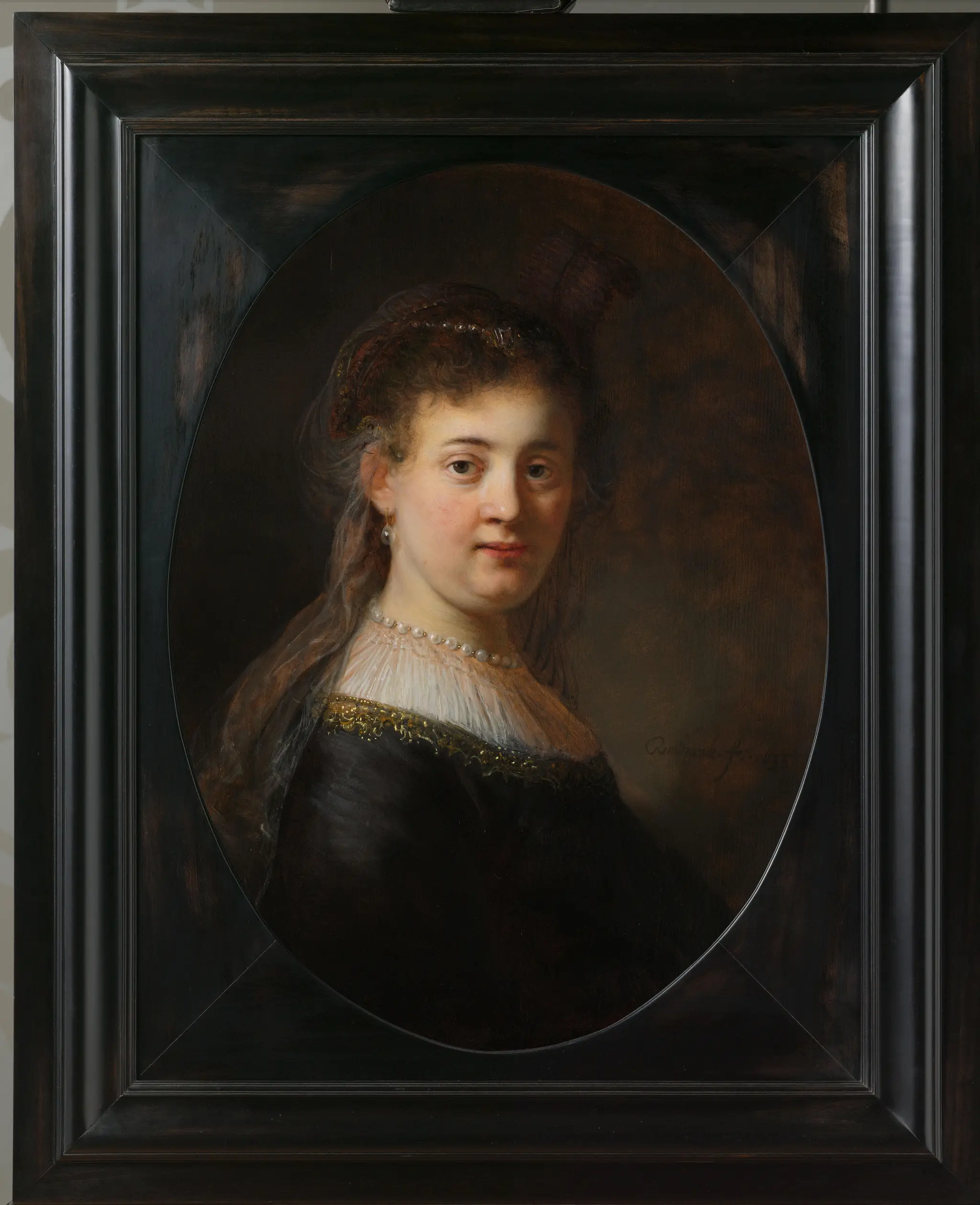 Young Woman in Fantasy Costume by Rembrandt van Rijn