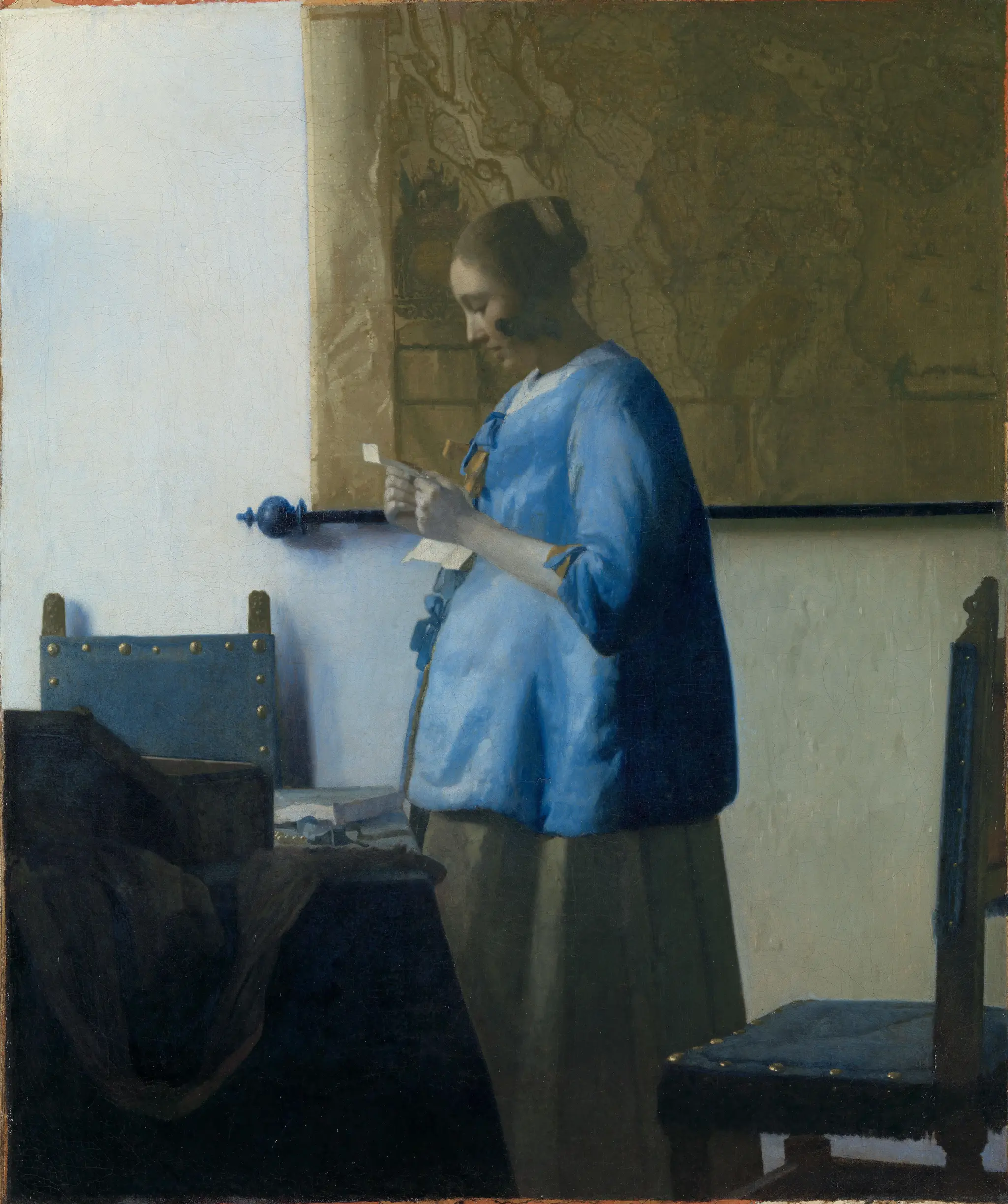 Woman in Blue Reading a Letter by Johannes Vermeer