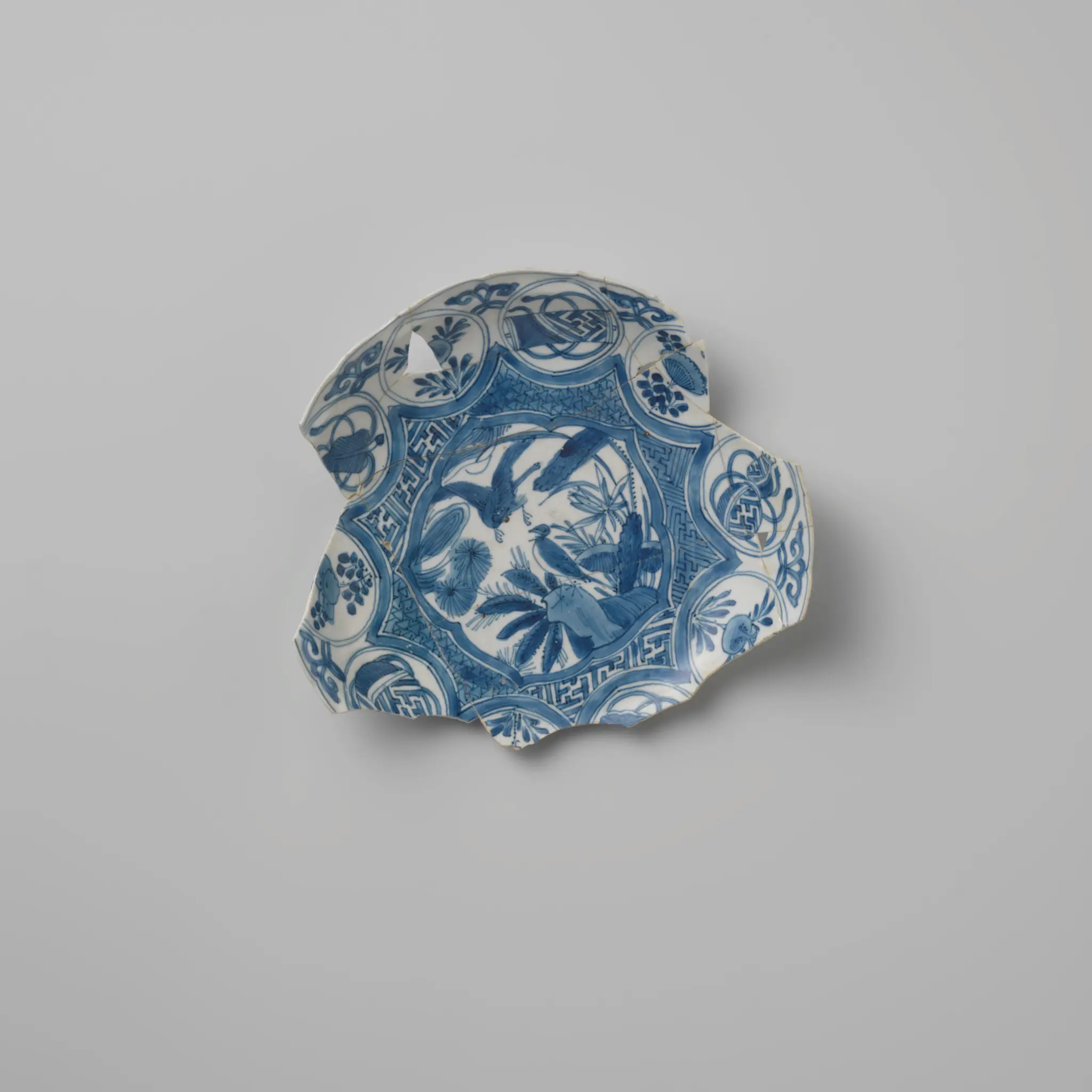 Fragmented dish of Chinese porcelain from the wreck of the Dutch East Indiaman Witte Leeuw by anonymous