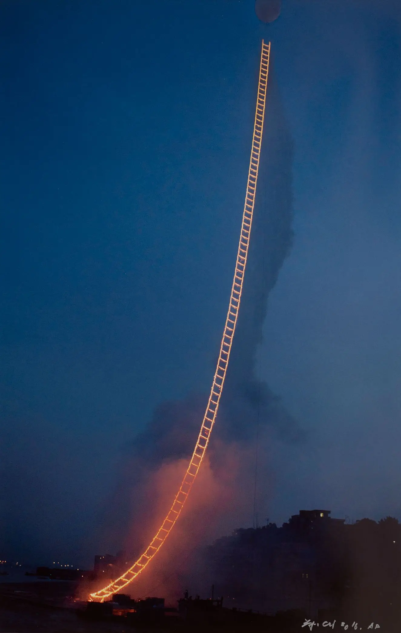 Sky Ladder [Photographic Documentation] by Cai Guo-Qiang