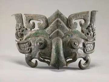 Appliqué in the Form of a Zoomorphic Mask by Chinese
