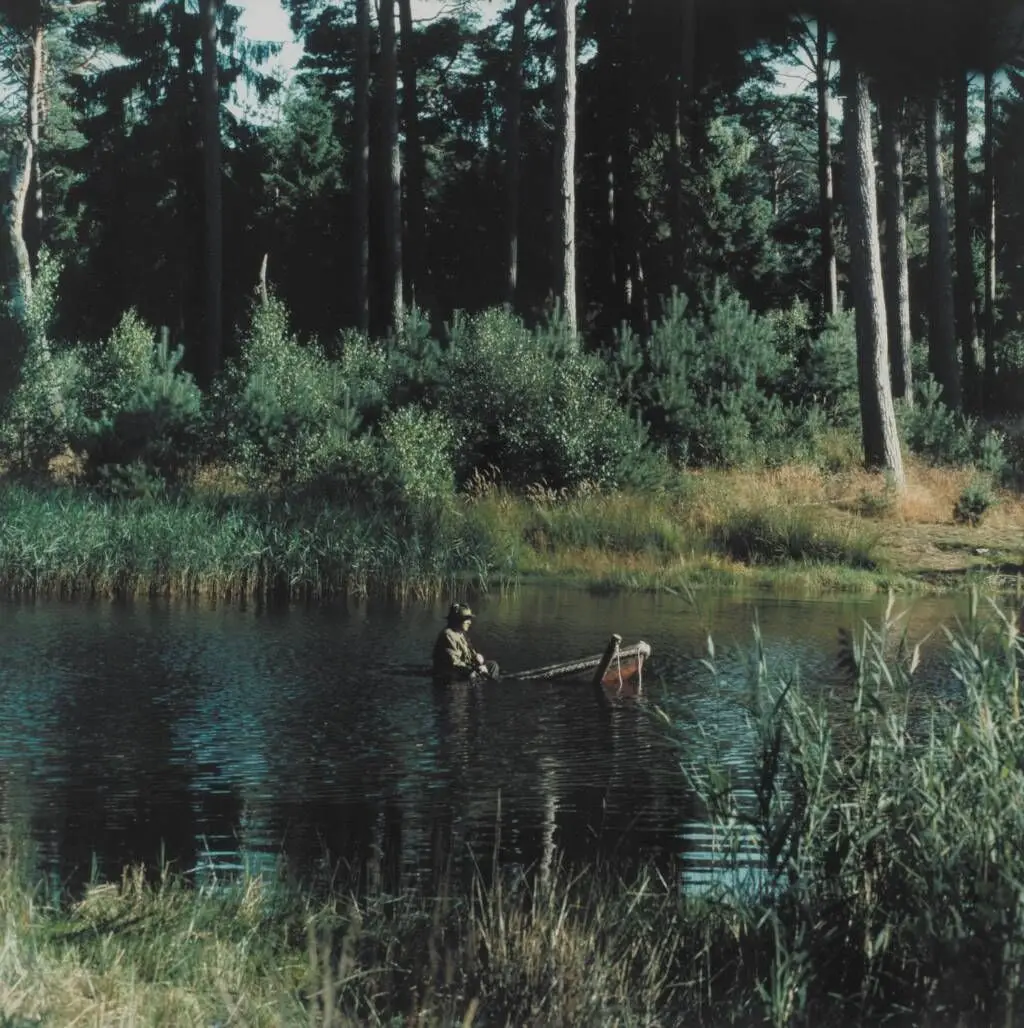 The Lake (The hunter sits in the boat after shooting; no. 2) 11 by Peter Land