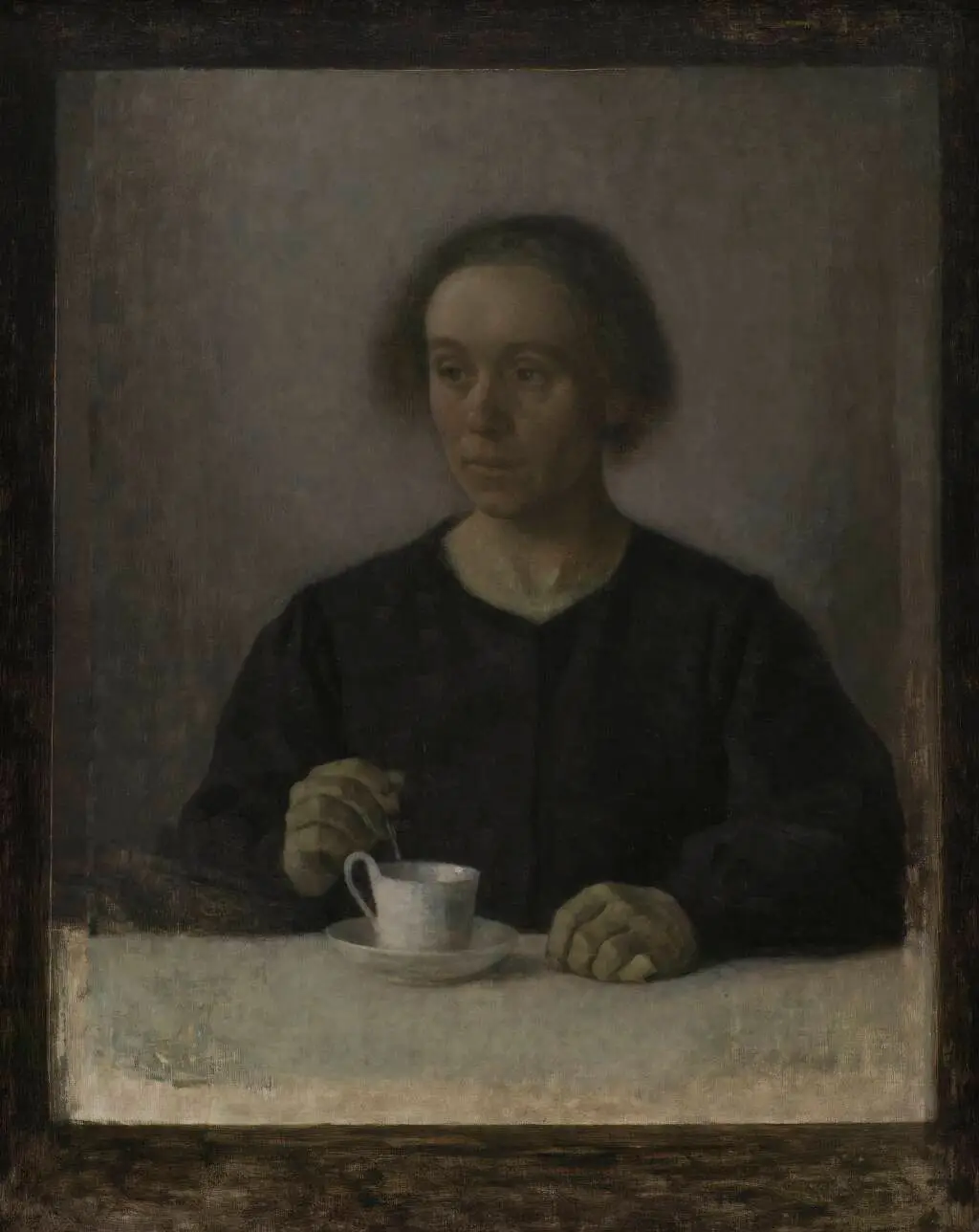Kunstnerens hustru Ida Hammershøi med en tekop by Vilhelm Hammershøi