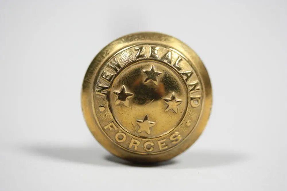 Hat pin made from New Zealand Army button by Dorothy Broad