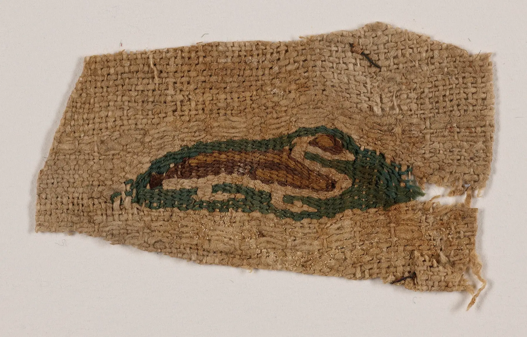 Fragment with a tapestry woven duck by Islamic