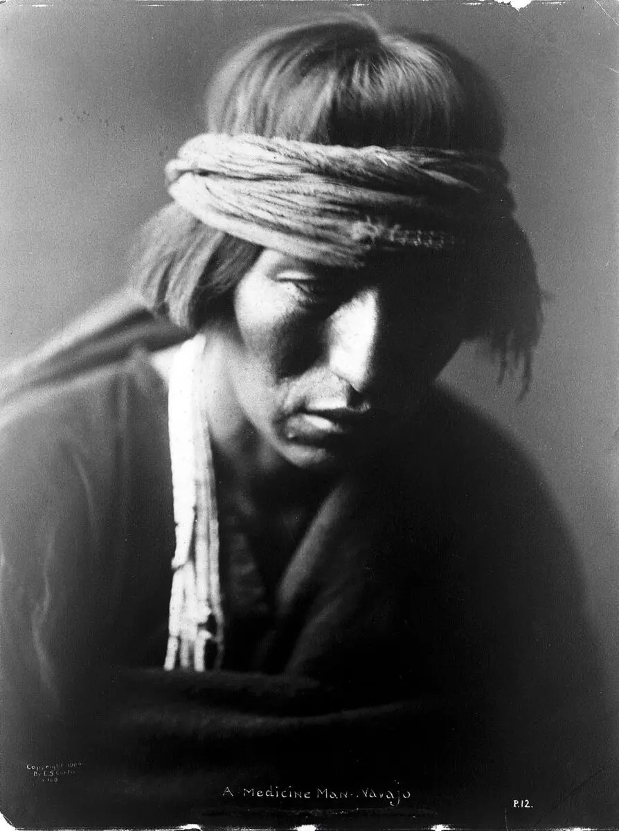 A Navajo medicine man. Photograph by Edward S. Curtis, 1904. by Edward S. Curtis