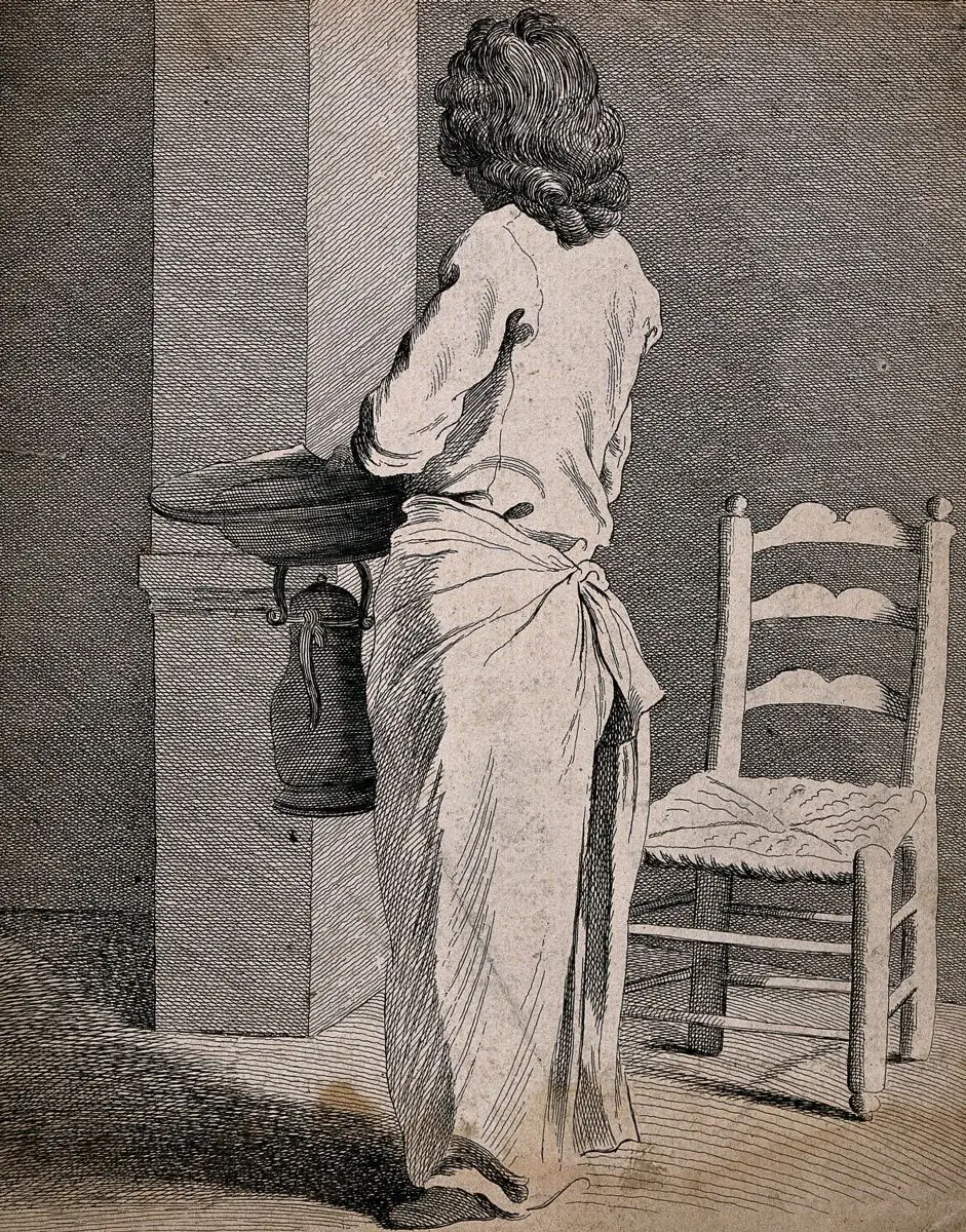 A barber with his back turned, standing by his chair. Etching by the Comte de Caylus, 1737, after E. Bouchardon. by Edme Bouchardon