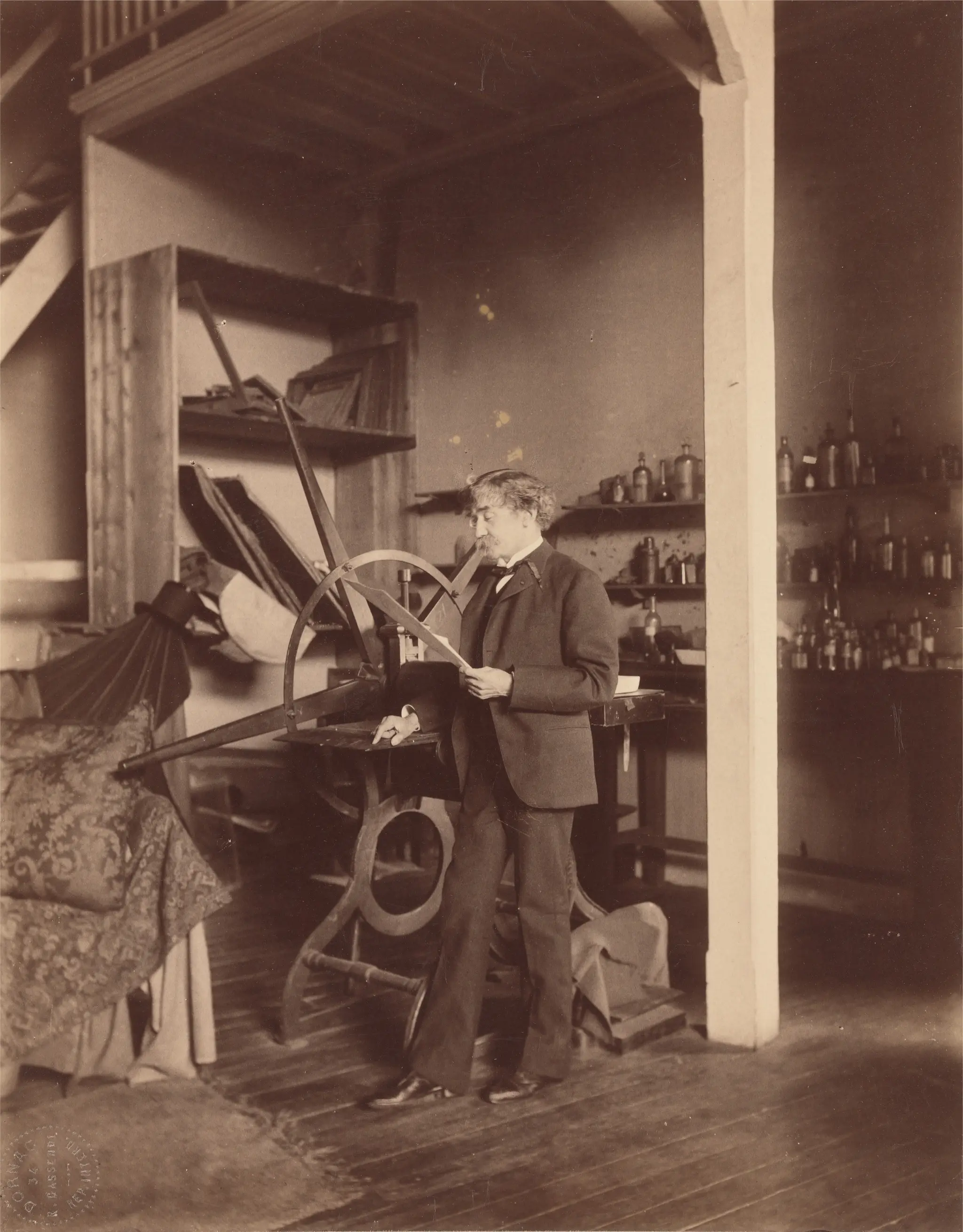 Whistler Standing at a Press in His Paris (rue Notre-Dame-des-Champs) Studio by Paul François Arnold Cardon, called "Dornac", 1859–1941