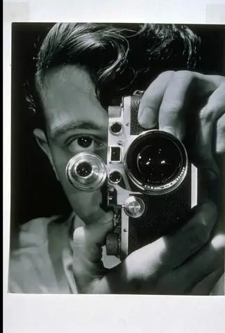 Man with Camera by Artist: Andreas Feininger