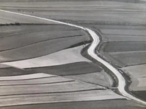 Abstract overhead view of tilled fields by Artist: Josef Sudek